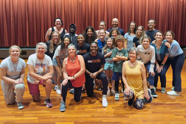 adults and children at dance workshop